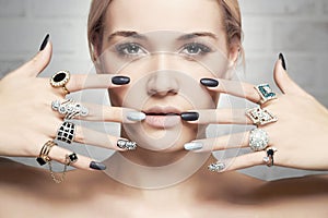 Fashion woman with jewelry and manicure