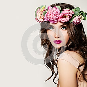 Fashion Woman. Makeup, Curly Hair and Pink Flowers