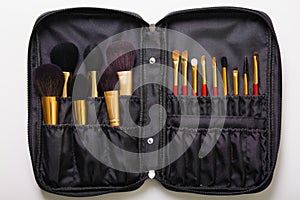 Fashion woman objects. Make up bag with cosmetics on white background. fkat lay, top view