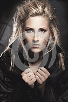 Fashion woman portrait in leather jacket