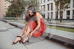 Fashion woman portrait in red dress.