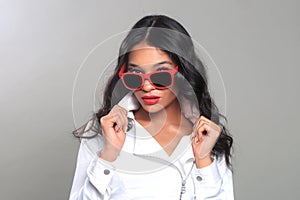 Fashion Woman Posing with Sun Glasses in Studio