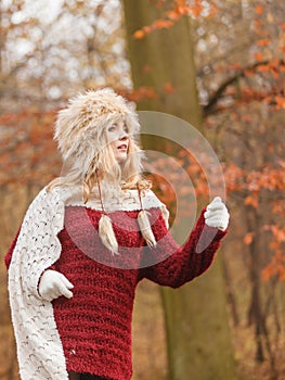 Fashion woman running in fall autumn park forest.