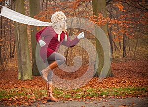 Fashion woman running in fall autumn park forest.