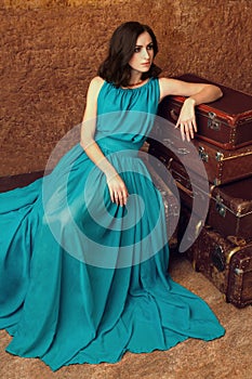 Fashion woman with suitcases