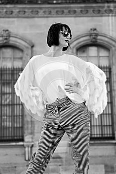 Fashion woman in sunglasses pose in paris, france. Fashion, accessory, vogue.