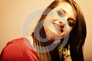 Fashion woman teen girl in red gown with dry rose.