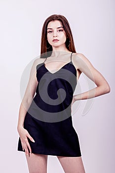 Fashion woman white background studio shoot black dress