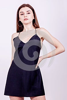 Fashion woman white background studio shoot black dress