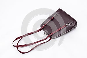 Fashion women leather dark red backpack isolated on a white background.