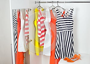 Fashion women's dresses on hangers