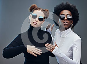 Fashion, women with sunglasses and futuristic with robotics, cyberpunk and trendy. Future design, females or girls with