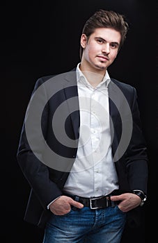 Fashion young businessman black suit