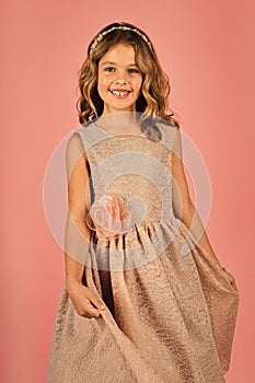 Fashion young kid model fece close up. Face female kid wiht happy emotion.