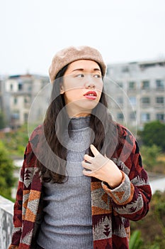 Fashionable Asian girl on the rooftop