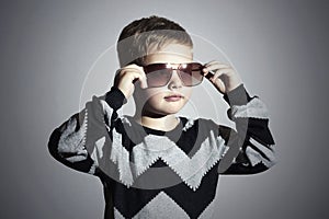 Fashionable boy in sunglasses.Little boy.Kids fashion