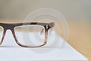 Fashionable brown eyeglass frame. Glasses for myopia.