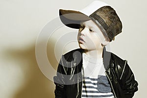 Fashionable Child.stylish little boy in tracker Cap.fashion children.Tracker Hat