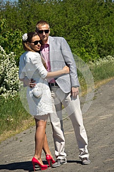 Fashionable couple in country