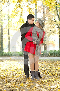 Fashionable couple in park