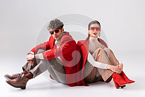 Fashionable couple in red blazers and