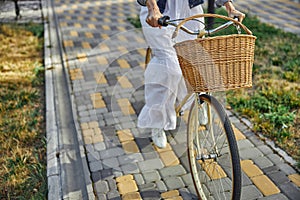 Fashionable female riding on the bike in the outdoors