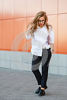 Fashionable female student with tablet pc