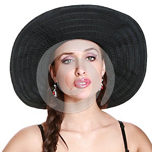 Fashionable girl in black bonnet