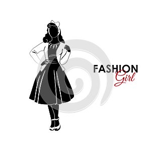 Girl. Fashion. Silhouette of a girl. Girl in the dress of the 60`s photo