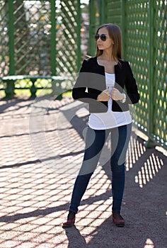 Fashionable girl in greenhouse