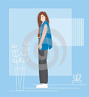 Fashionable girl in jeans. Stylish woman with long hair.