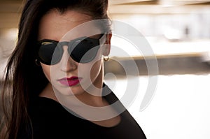 Fashionable girl with sunglasses