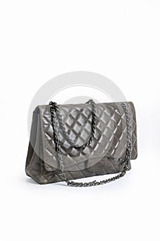 Fashionable gray classic women`s bag of textured leather