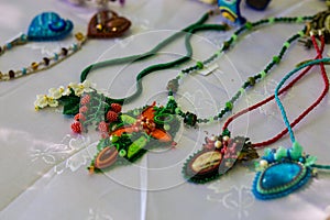 Fashionable handmade accessories for women. Decorative beads necklaces and bracelets