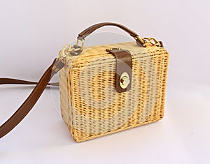 Fashionable handmade natural organic rattan bag. Trendy bamboo eco bag from bali isolated on white background