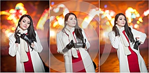 Fashionable lady wearing red dress and white coat outdoor in urban scenery with city lights in background. Full length portrait