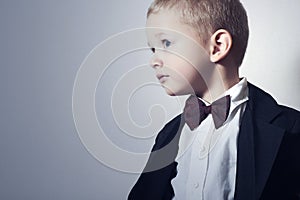 Fashionable Little Boy in Bow tie.Stylish kid. fashion children. 4 Years Old Child in Black Suit