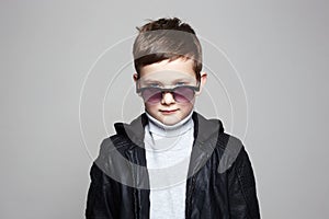 Fashionable little boy in sunglasses. stylish kid