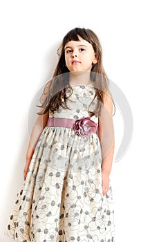 Fashionable little girl in gorgeous gown.