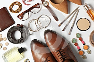 Fashionable male and female accessories on white, flat lay