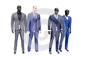 Fashionable men`s suits on dummies