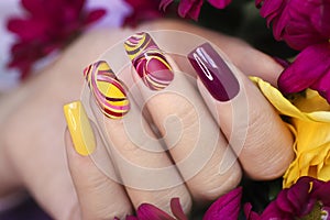 Fashionable multicolored manicure.