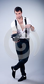 Fashionable muscular man with hat