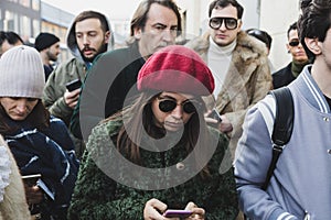 Fashionable people at Milan Men`s Fashion Week