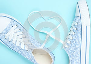 Fashionable sneakers, laces in the shape of heart