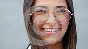 Fashionable student watching, gazing with trendy optometry vision glasses. Detail closeup portrait of funky, cool and