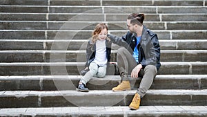 Dad and daughter walk around the city