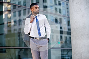 Fashionable stylish modern African american businessman corporate executive entrepreneur model, commercial lifestyle portrait down