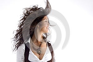 Fashionable teen with her hair fluttering in air