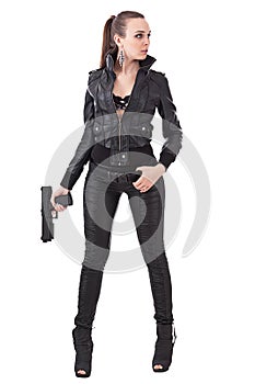 Fashionable woman with a gun